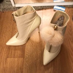 Cream ankle high heel boots
